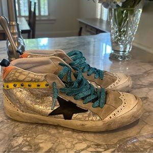 Barely worn mid star golden goose in size 38